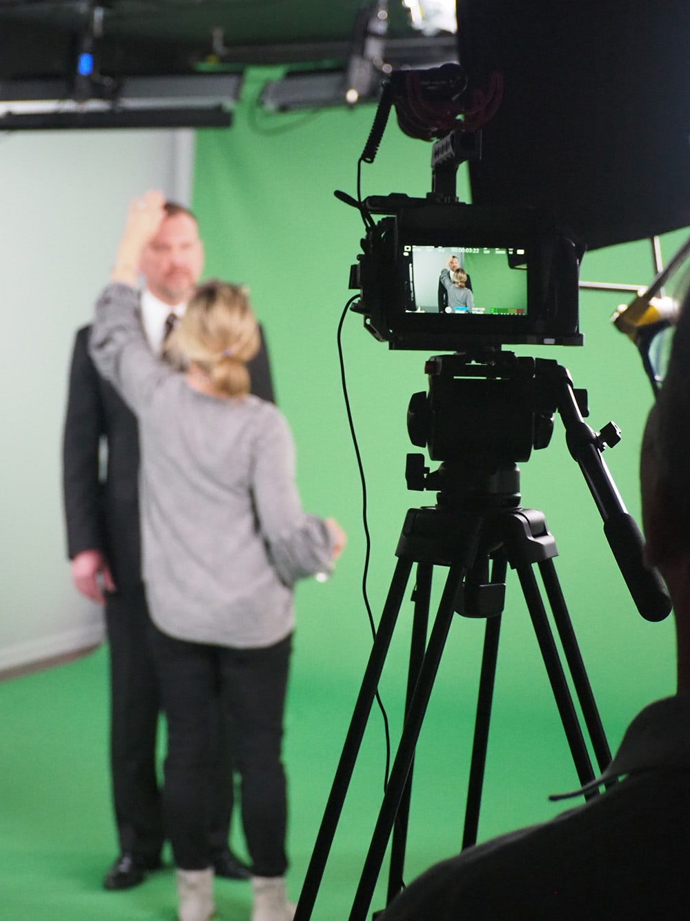 Law Firm TV Production shoot in front of a green screen