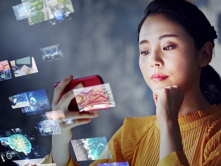 Woman watching video on her phone