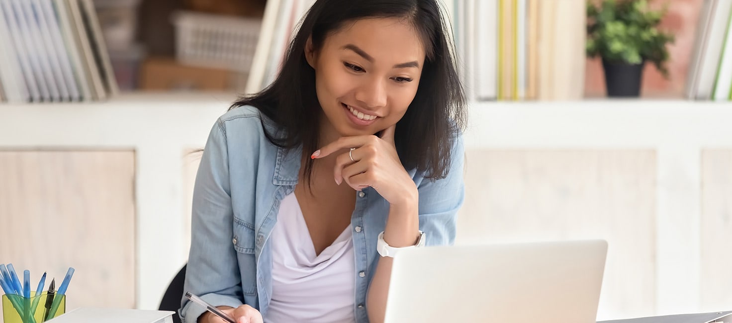 woman studying on a laptop